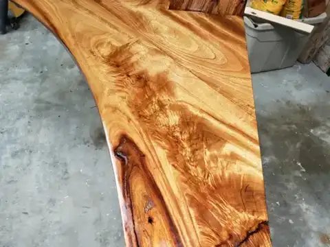 Close view of a figured live-edge wood slab