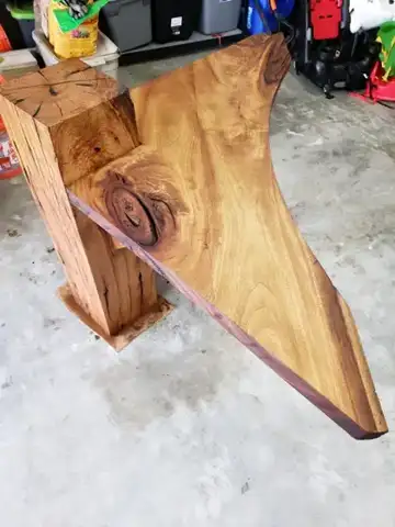 Live-edge corner shelf on a wood post