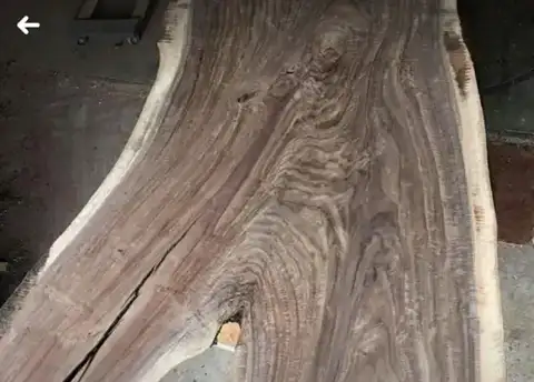 Close view of dark figured wood grain