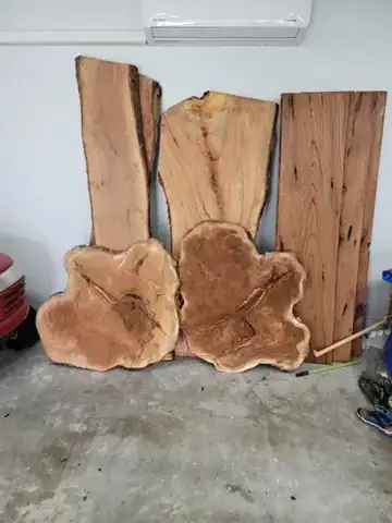 Live-edge slabs with burls in the garage