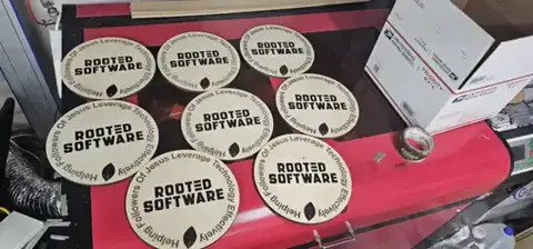 Rooted Software coasters on the laser bed