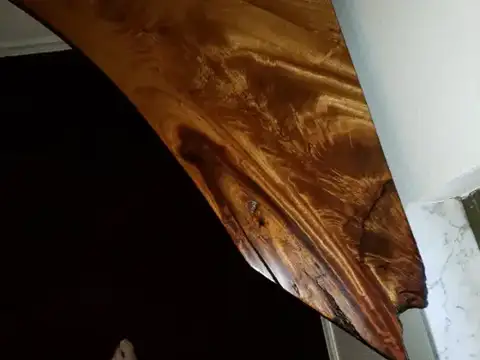 Close view of a figured live-edge slab edge