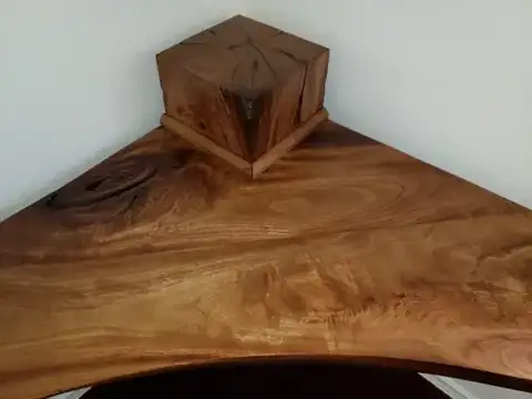 Live-edge corner shelf with a wood box on top