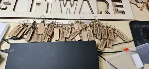 Cut Rooted Software letters on the workbench