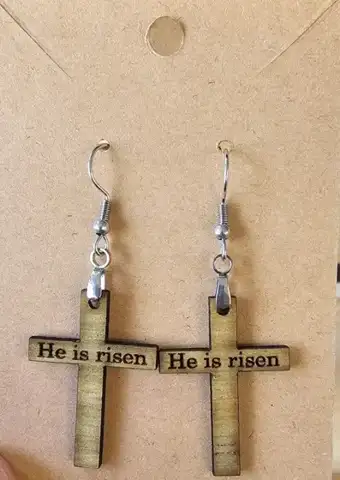 He is risen cross earrings on a card