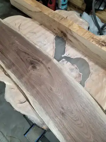 Long dark wood slab with a live edge
