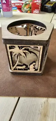 Christmas lantern with palm tree cutouts, top open